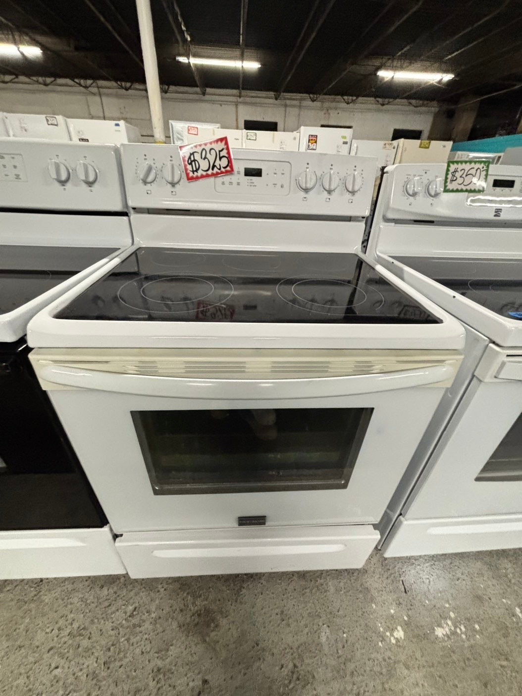 -Frigidaire glass top electric range 220v 5 burner warm zone bake broil self clean used-Refurbished white color fast boil 30"    Stock number #EF350CB