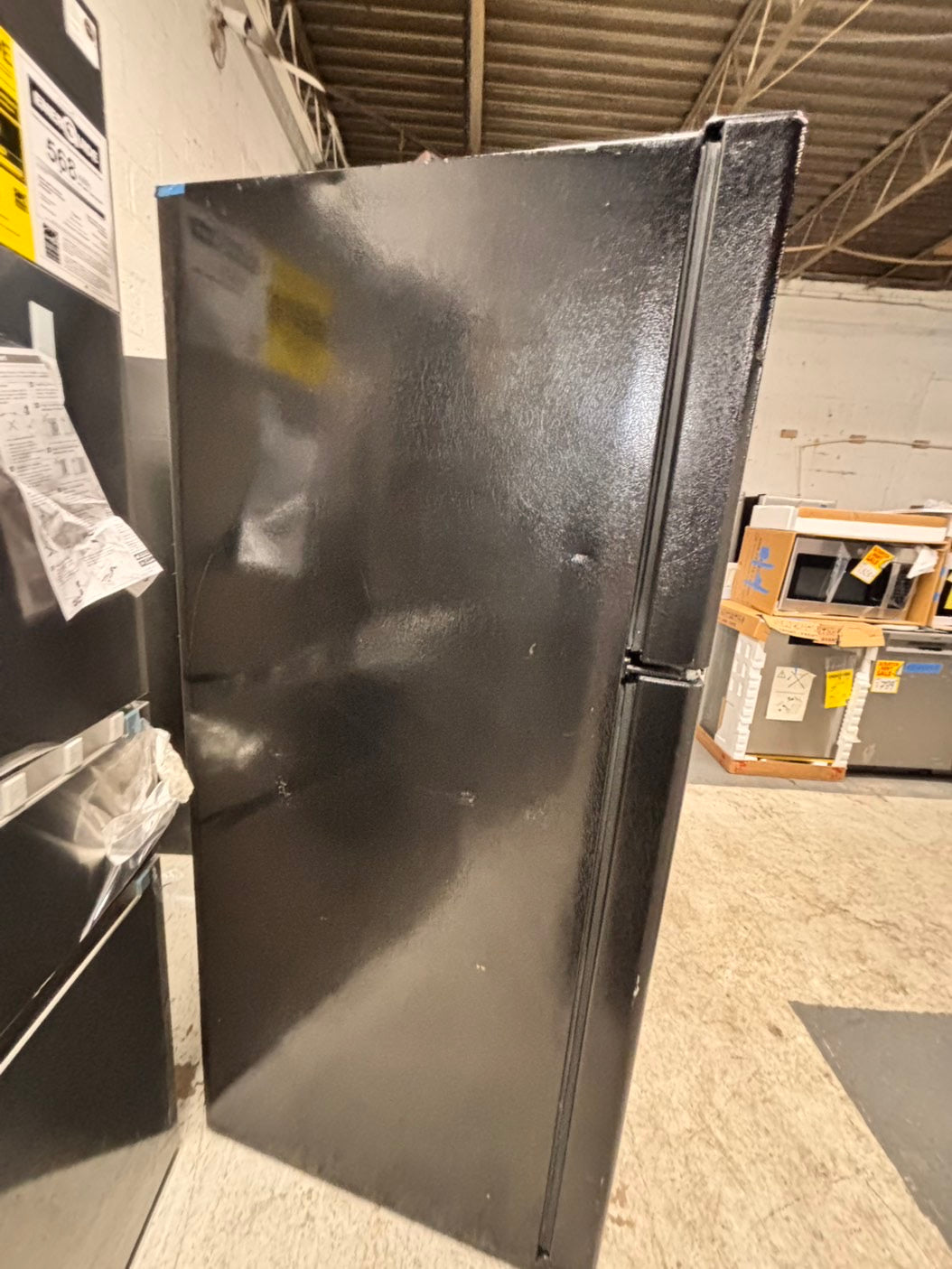 >GE  33” Top freezer fridge   With ice maker inside ,black  used-refurbished #RG21QB