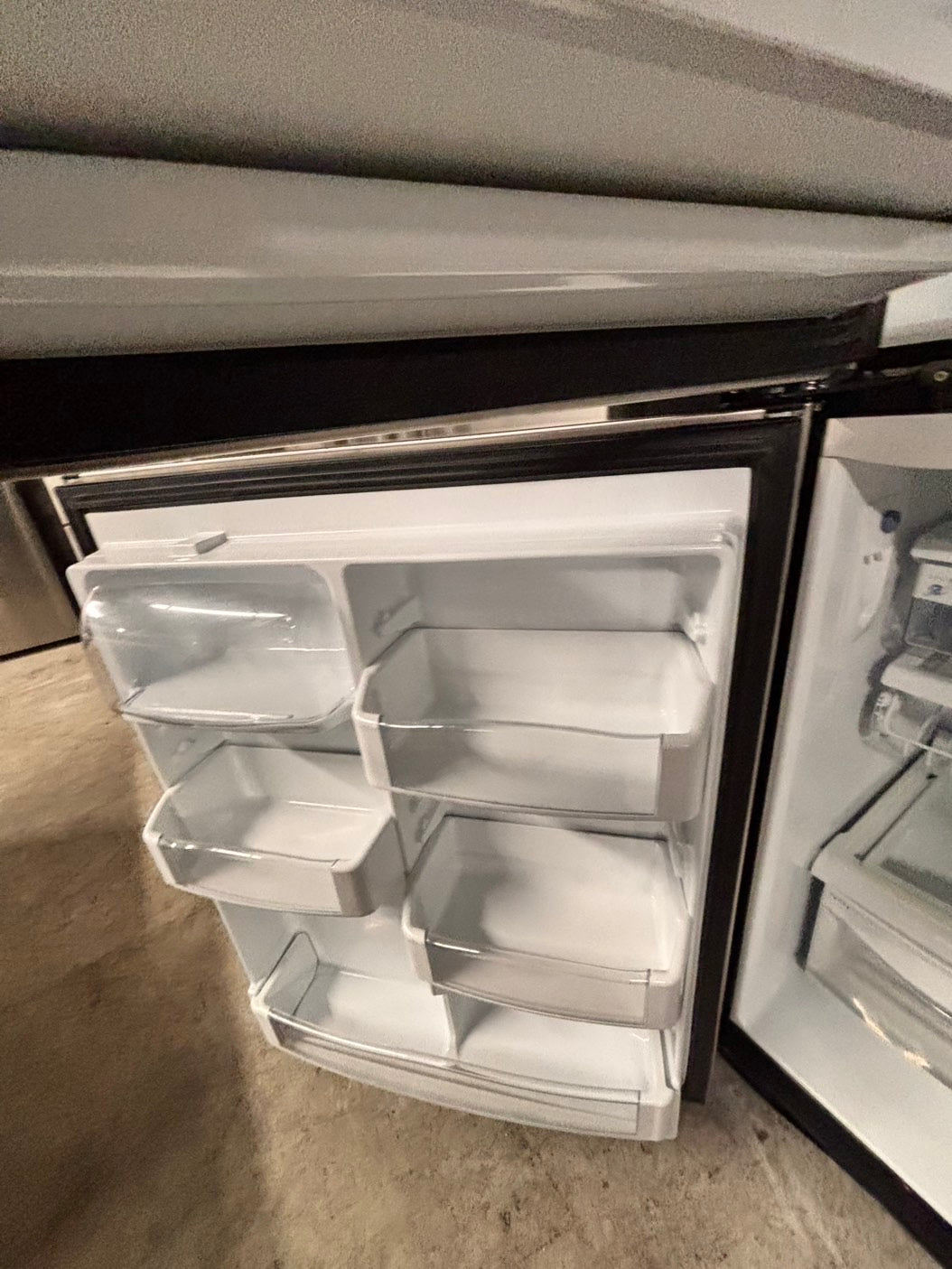 >GE  33” Top freezer fridge   ,stainless steel. used-refurbished #RG41T2B