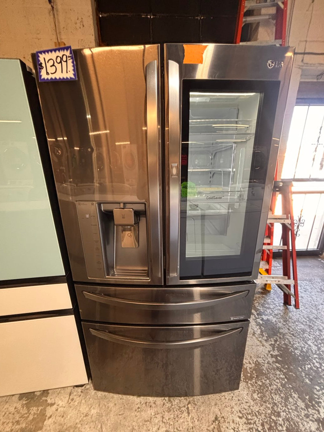 }}LG four door Refrigerator french doors full size 36”x 69” x 32”depth   black stainless steel w/ ice water dispenser great condition 36" used-refurbished #LGFBS324B