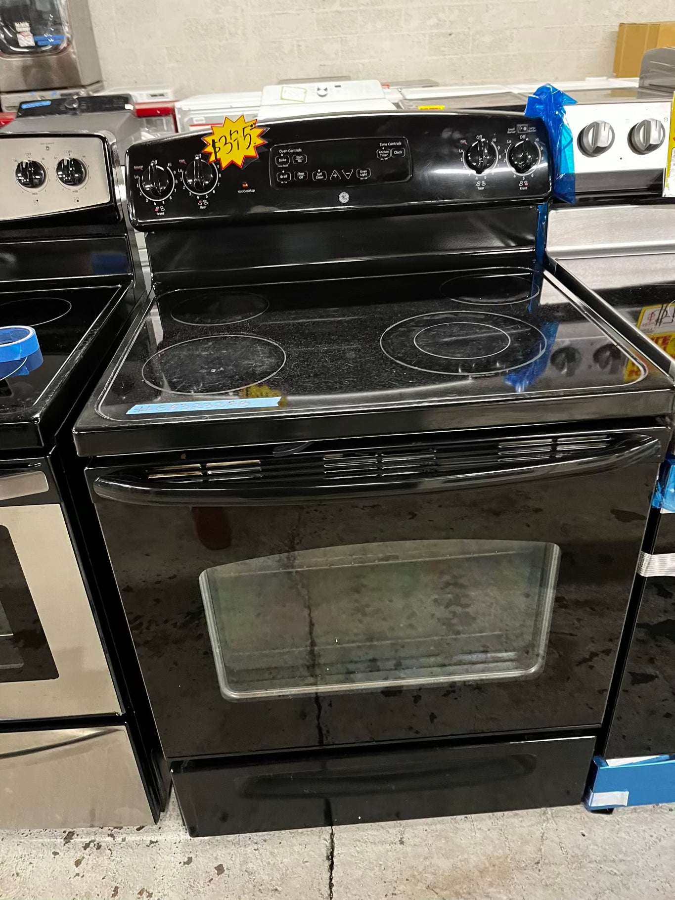 • GE glass top electric range 220v 4 burner Refurbished in black bake Broil hi/lo self clean  30" #ER3232AB