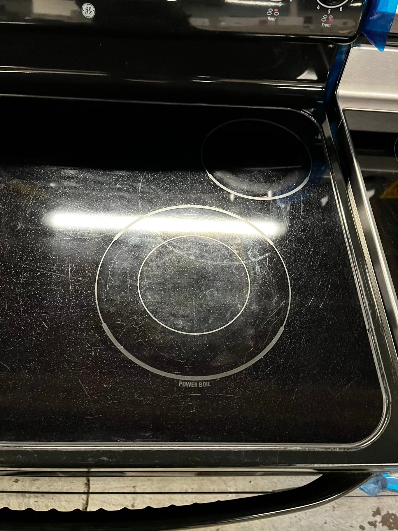 • GE glass top electric range 220v 4 burner Refurbished in black bake Broil hi/lo self clean  30" #ER3232AB