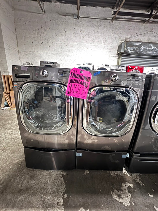 >used- refurbished LG front load double washer & dryer set electric 220v large capacity with small washer on the pedestals in dark stainless steel 27” #ELPV7B