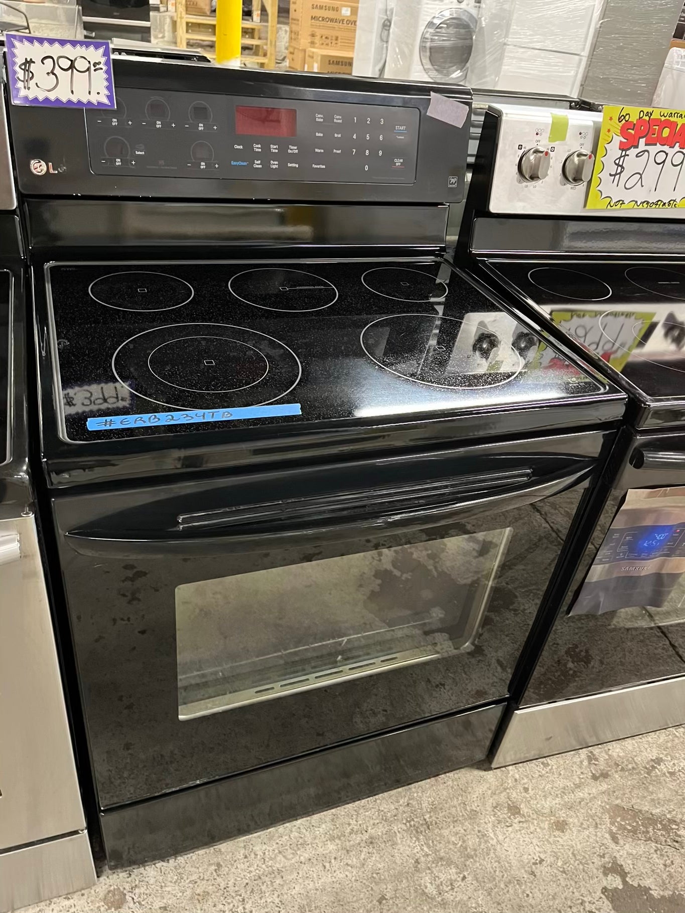 - LG electric range black  5 burner warm zone convection bake broil self clean 30” item number #ERB234TB