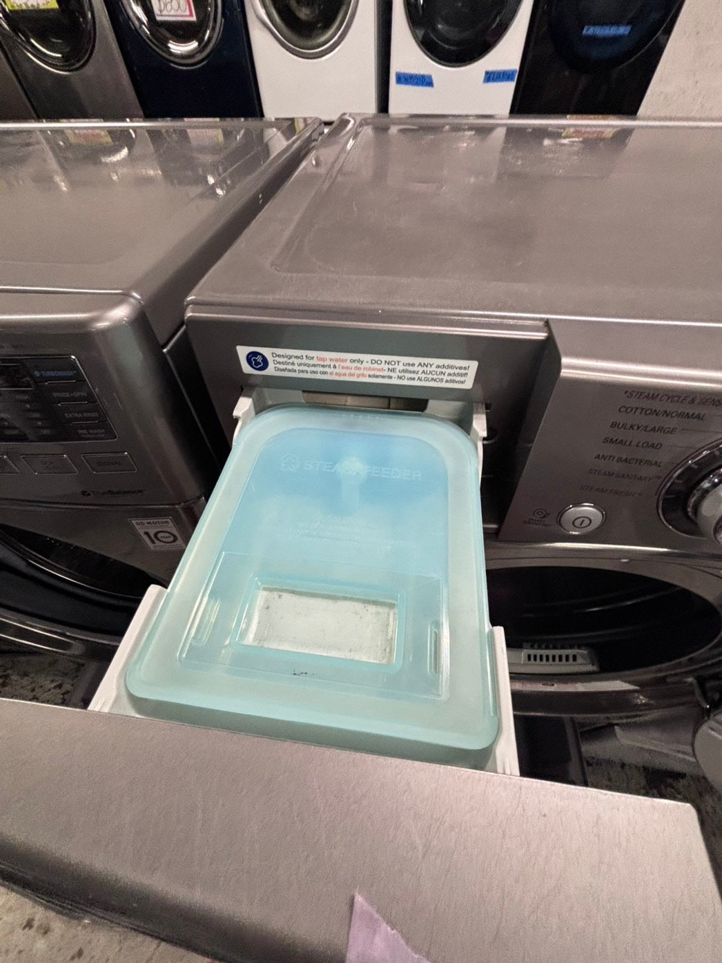 >used- refurbished LG front load washer & dryer set electric 220v large capacity with pedestals in stainless steel 27” #ELY3X45B