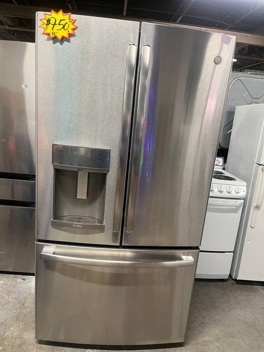 *Used | Refurbished GE profile 36” 28cu.ft. French door refrigerator stainless steel w/ice water dispenser 36" stock number #RFGE22B