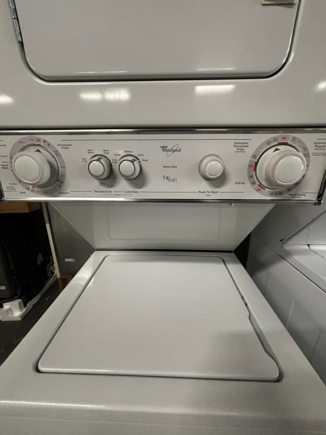 - Whirlpool stacked laundry center  110v gas unit washer & dryer set in white 24" #LCW852PB