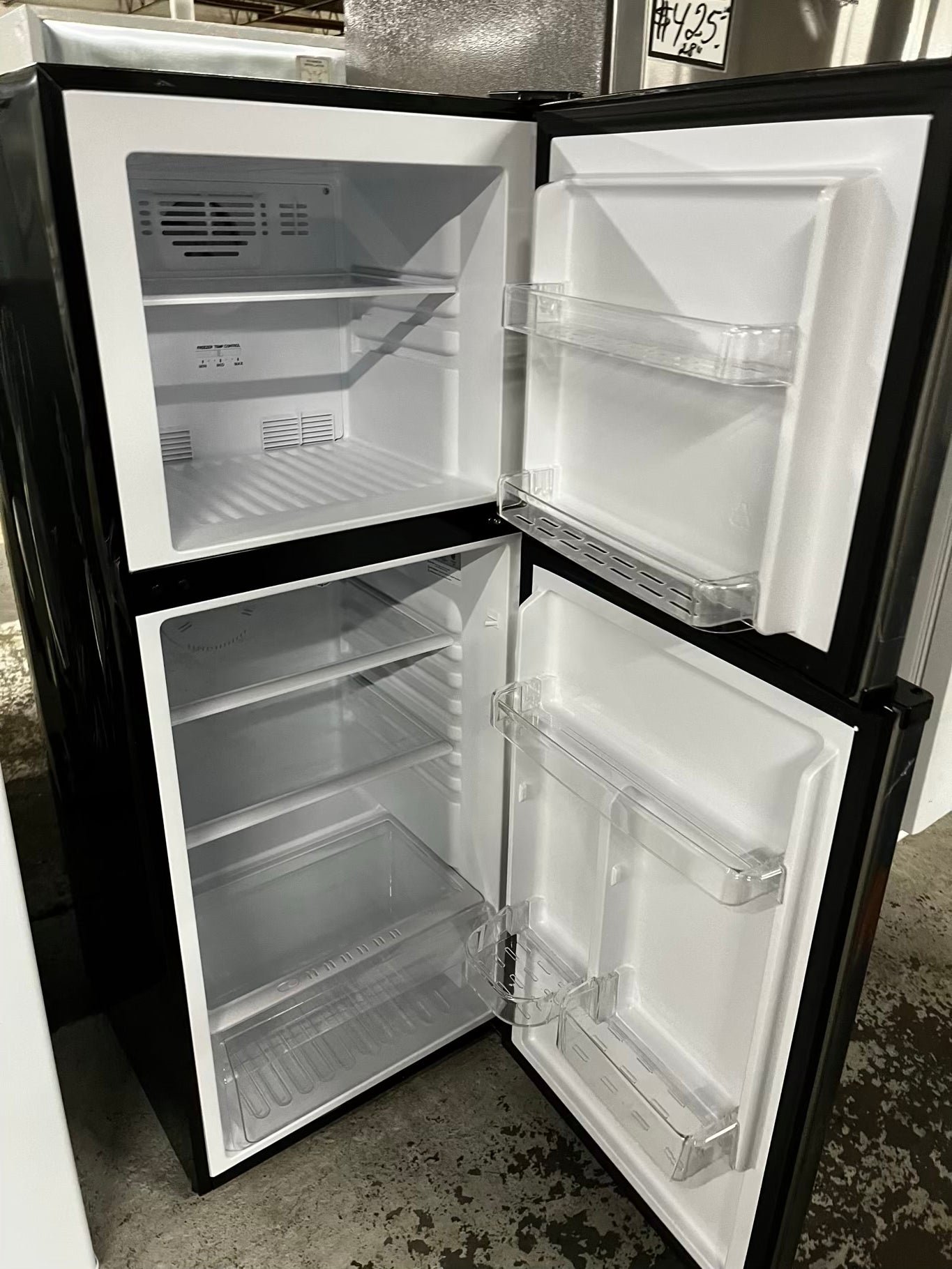 * Used | Refurbished Haier top freezer refrigerator 24" #RF3692NB
