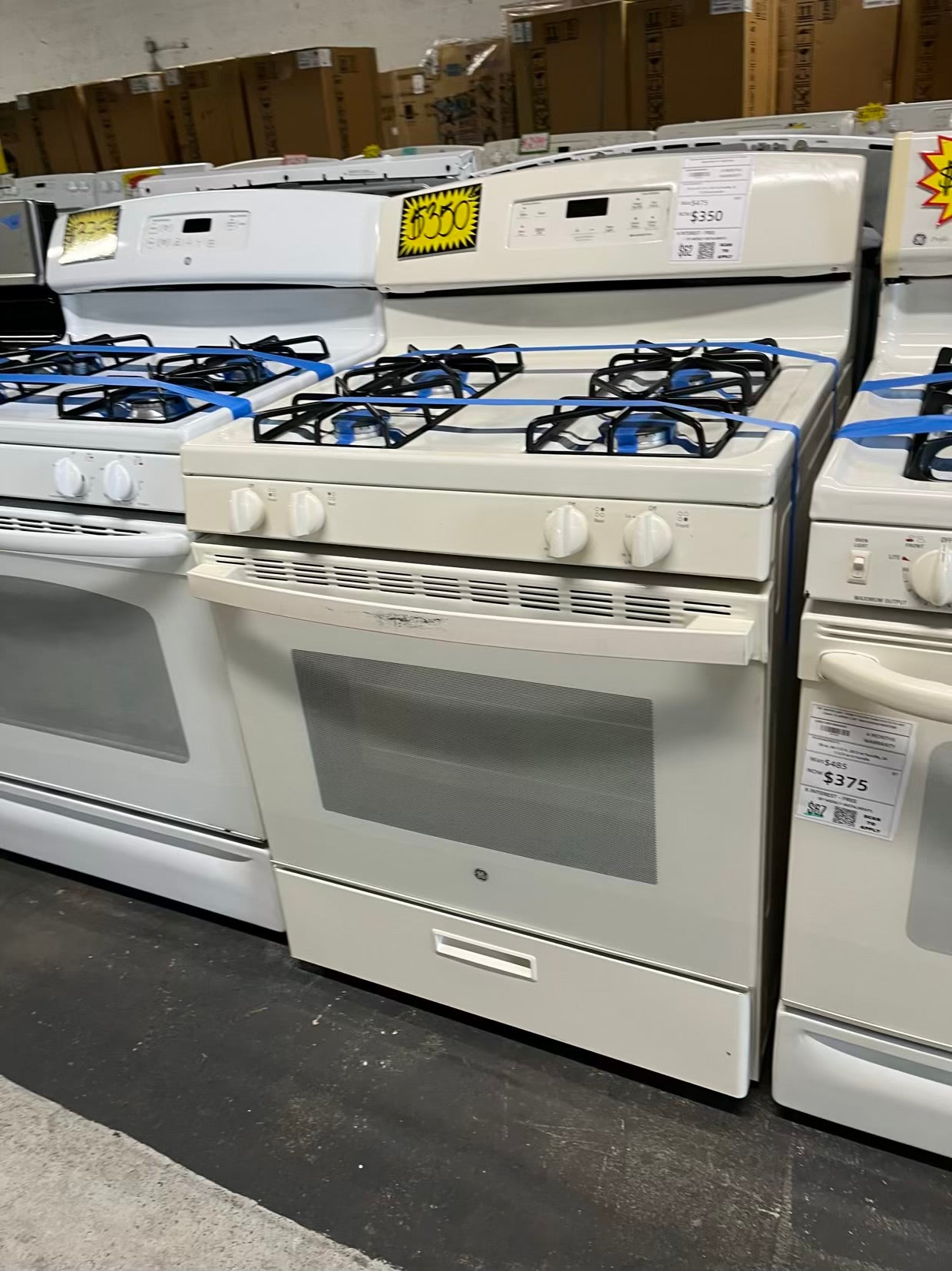 GE Gas range 4 burner bake broil hi/lo in off white Refurbished 30" #GR215WB