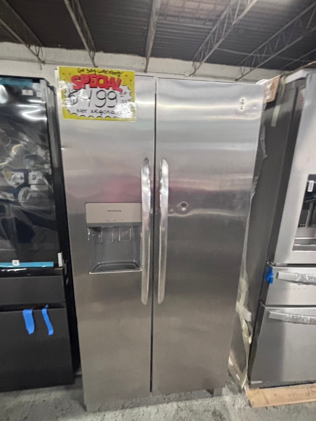>used-refurbished Frigidaire 33” Side by Side Refrigerator stainless steel w/ice water dispenser  - #RFUR33LB