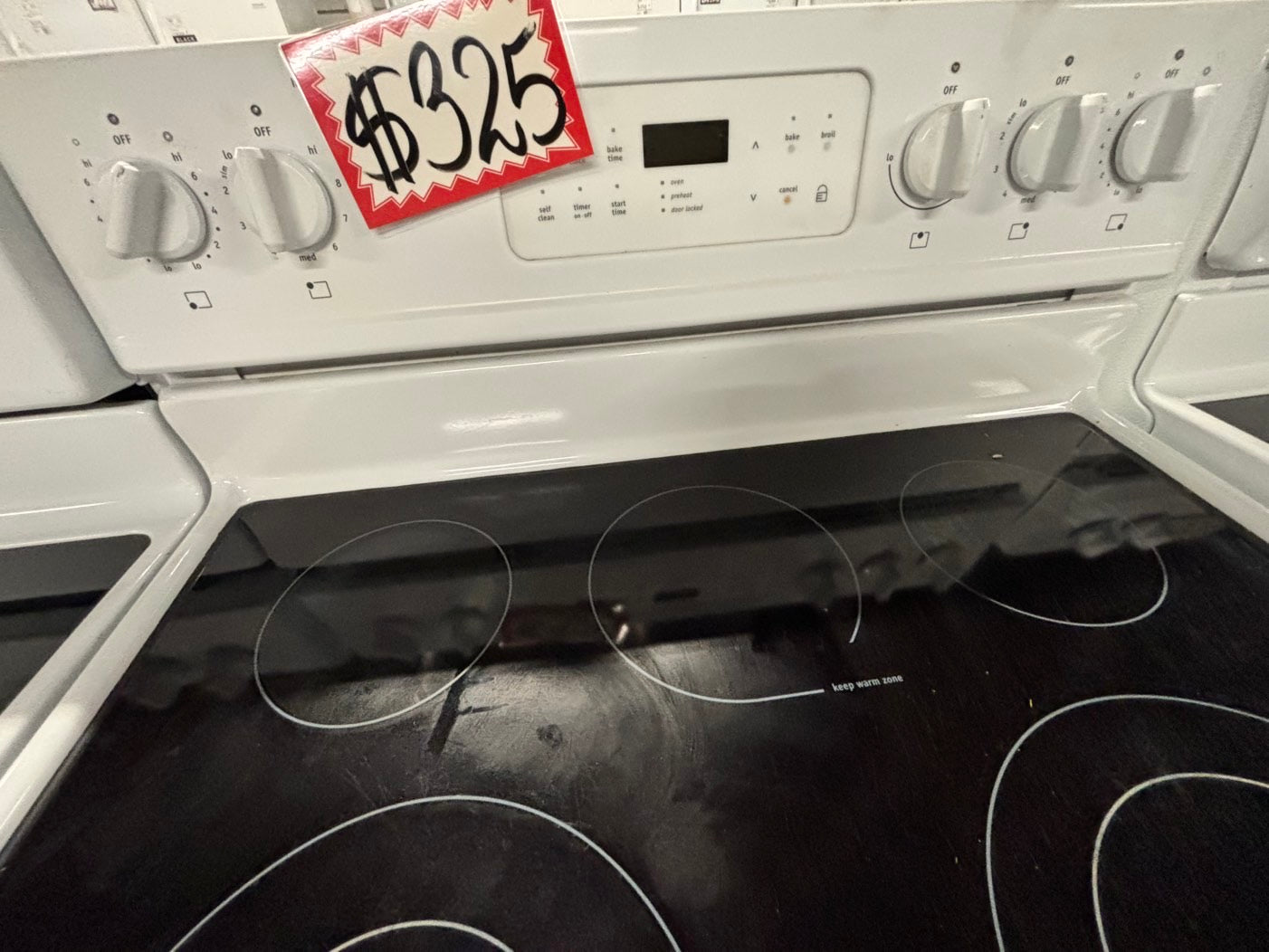 -Frigidaire glass top electric range 220v 5 burner warm zone bake broil self clean used-Refurbished white color fast boil 30"    Stock number #EF350CB