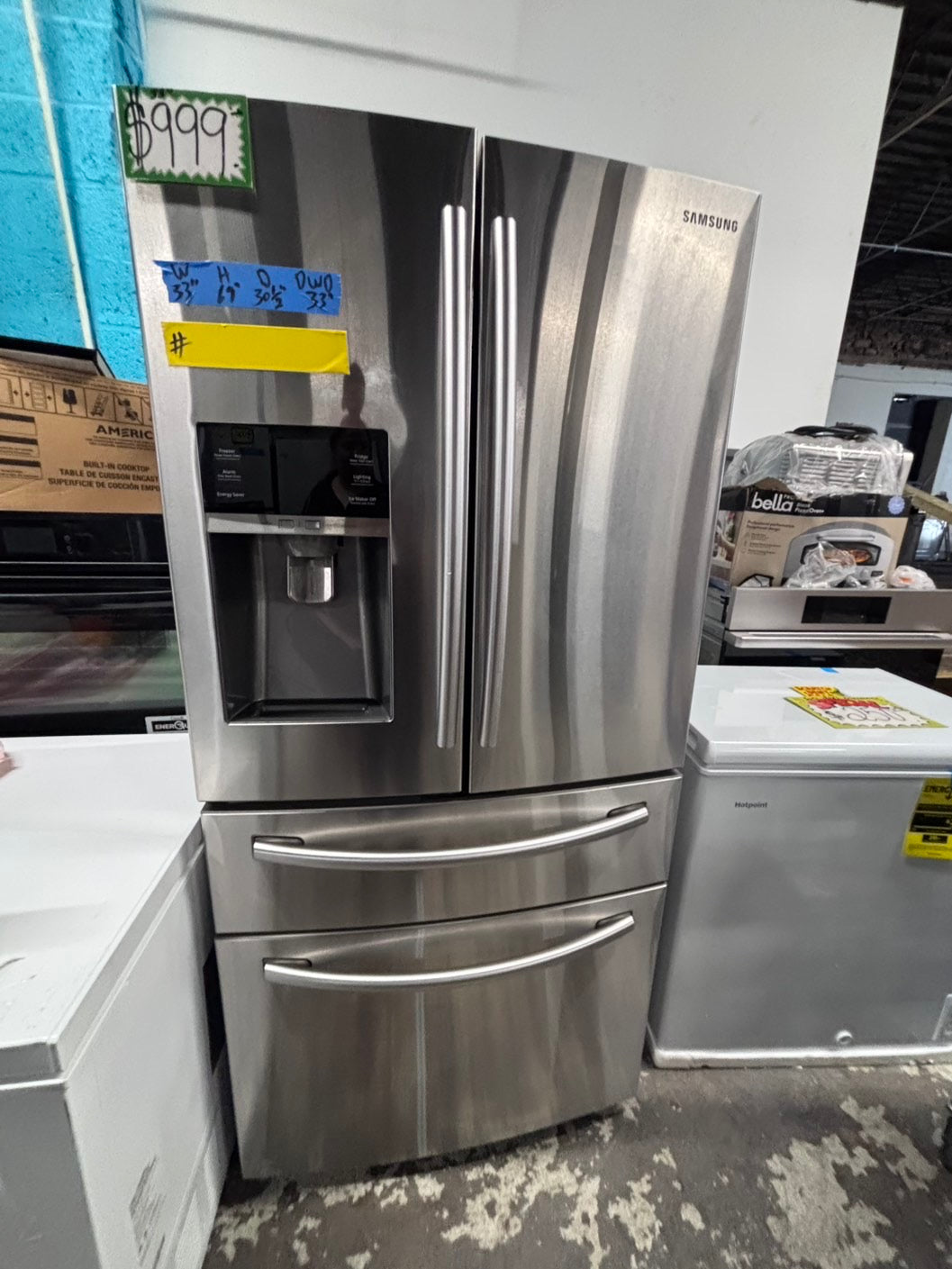 >*Samsung 4-doors French door Refrigerator 33w x 69h 30”1/2depth. /stainless steel w/ ice water dispenser 33" #RL7Q21QB