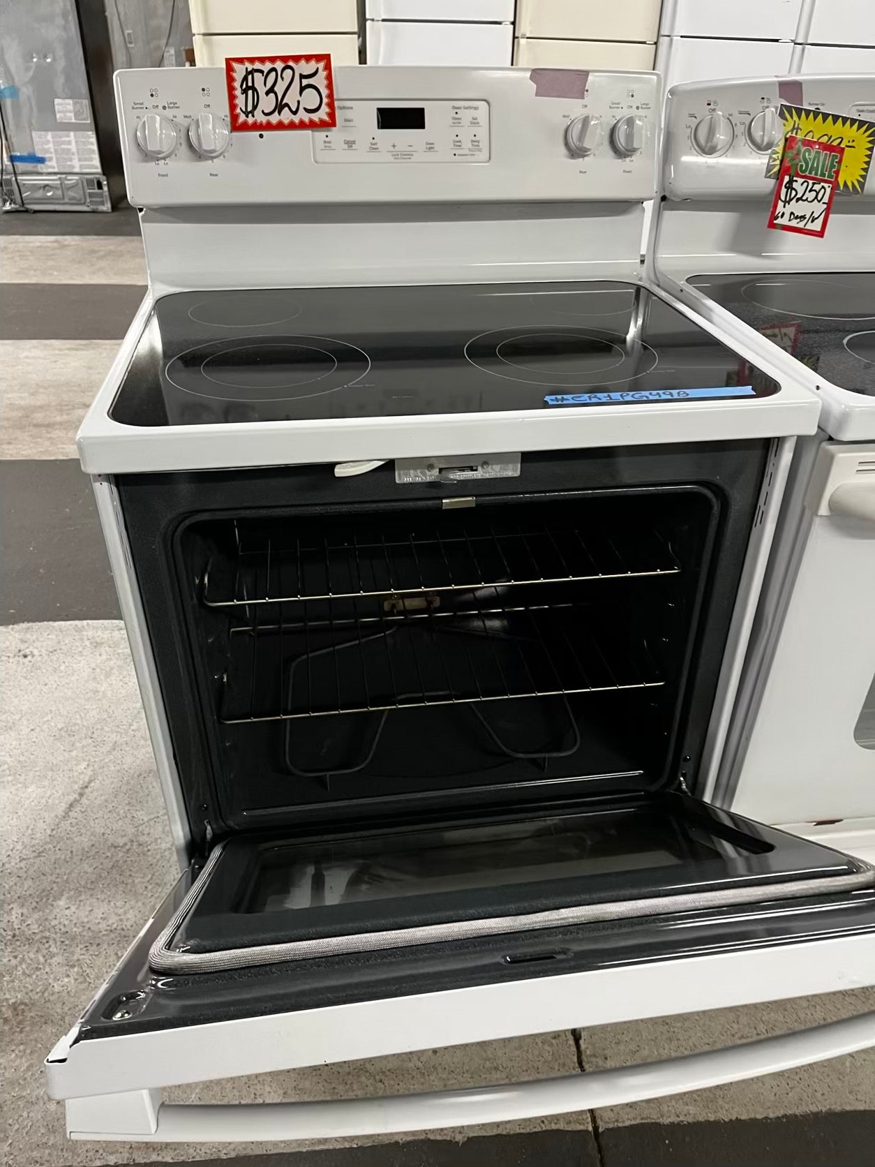 GE glass top electric range 220v 4 burner Refurbished bake Broil hi/lo self clean in white 30" #ER1PG49B