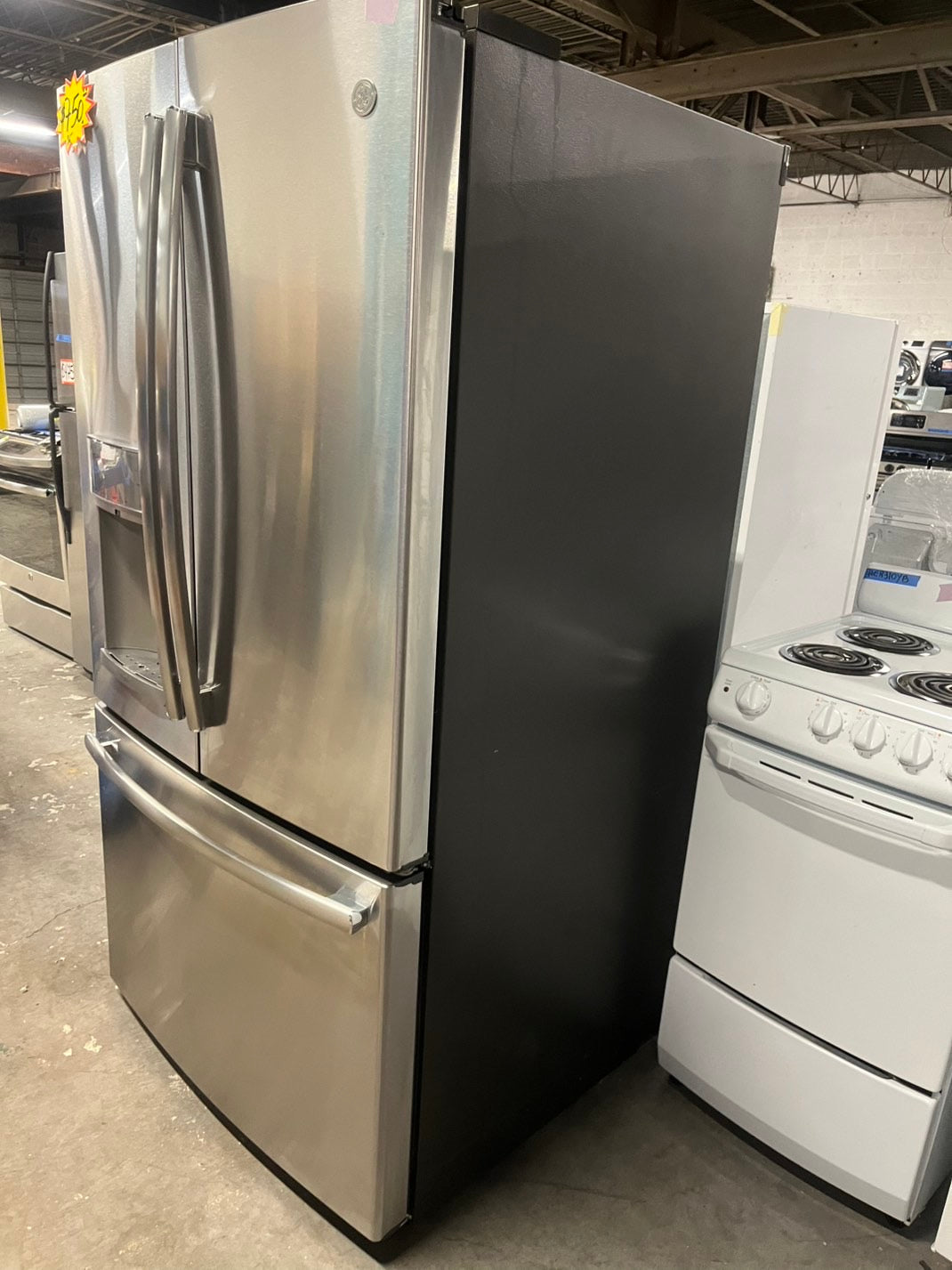 *Used | Refurbished GE profile 36” 28cu.ft. French door refrigerator stainless steel w/ice water dispenser 36" stock number #RFGE22B