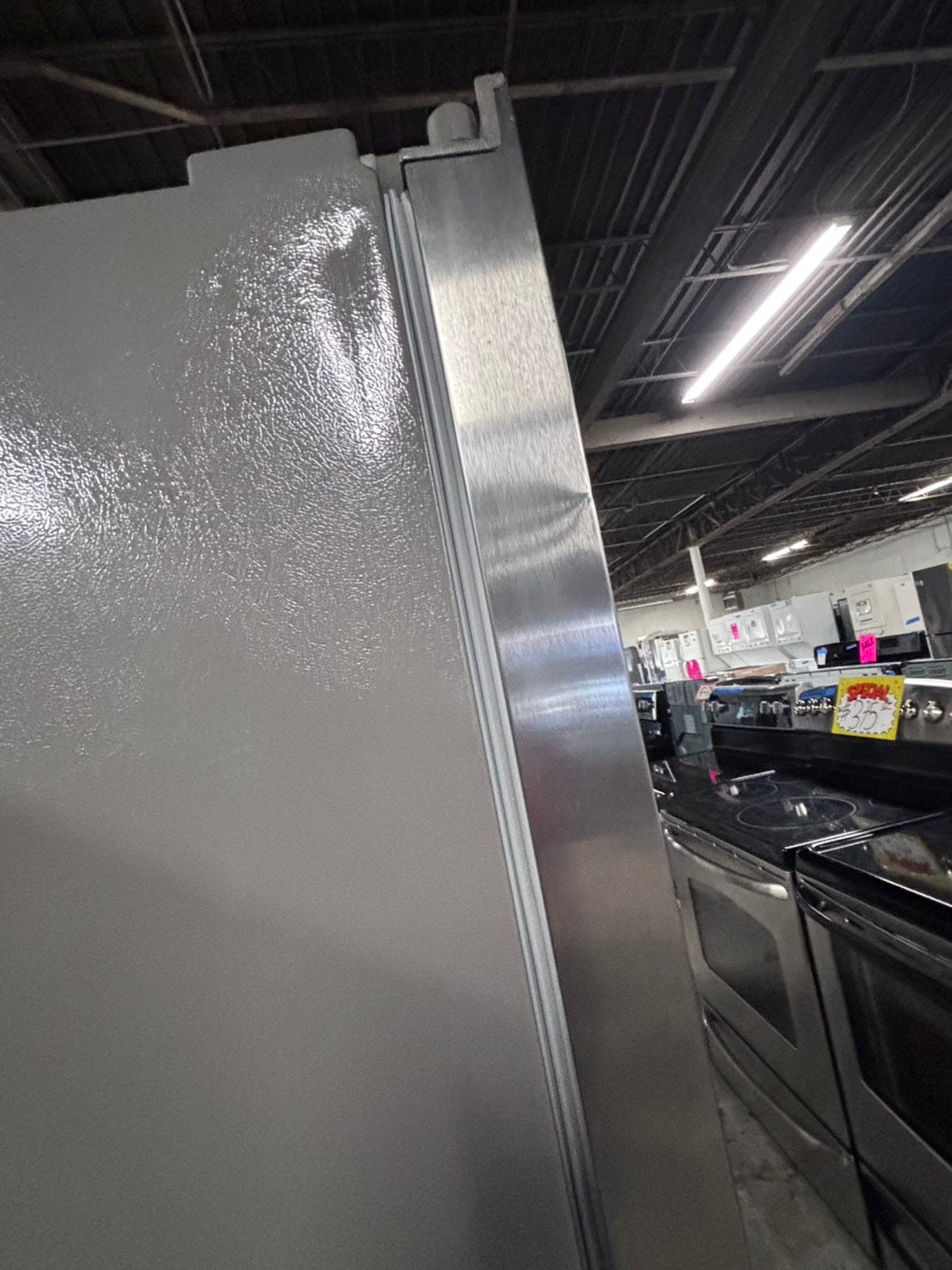 >used-refurbished Frigidaire 33” Side by Side Refrigerator stainless steel w/ice water dispenser  - #RFUR33LB