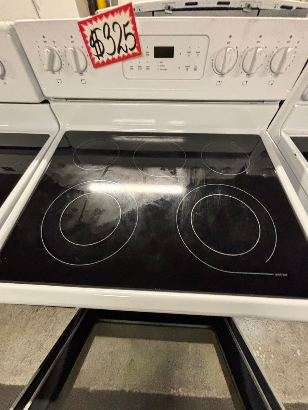 -Frigidaire glass top electric range 220v 5 burner warm zone bake broil self clean used-Refurbished white color fast boil 30"    Stock number #EF350CB
