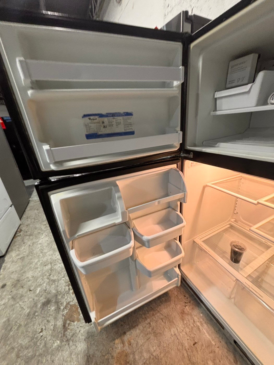 >*whirlpool  30” 18cu.ft -top freezer refrigerator black  with ice maker inside  used-refurbished #RW3B61B