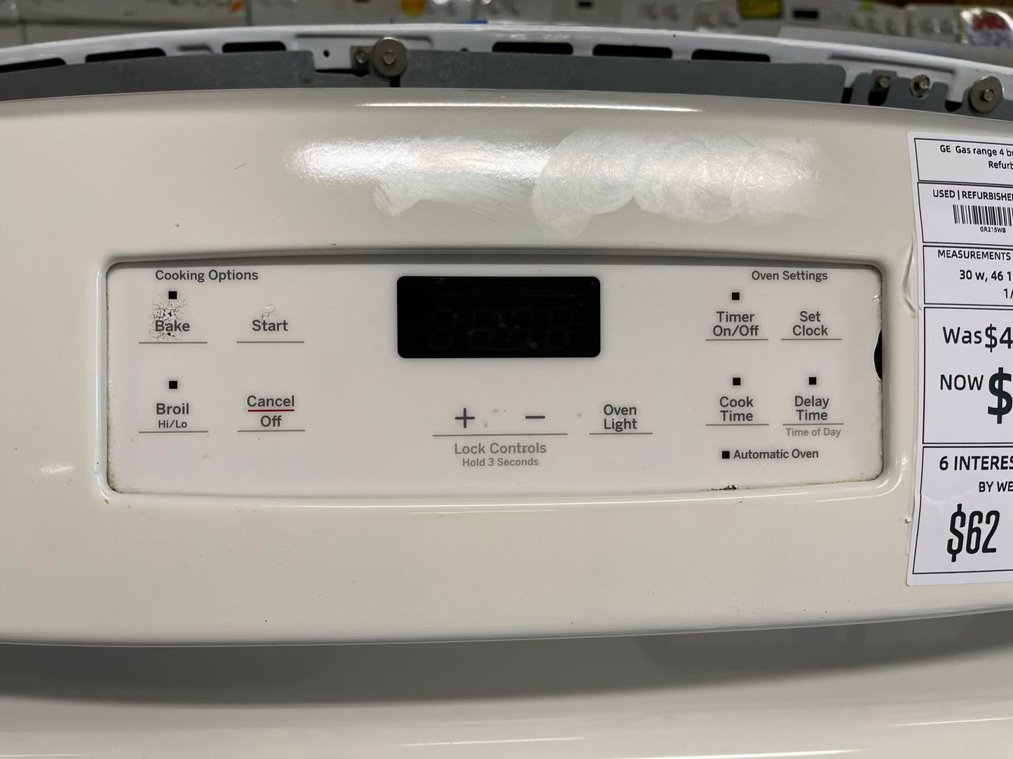 GE Gas range 4 burner bake broil hi/lo in off white Refurbished 30" #GR215WB