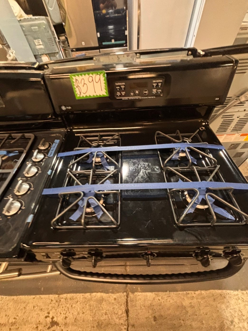 >*GE  gas range 4 burner bake broil Hi/Lo self clean in black used-Refurbished 30” #G9WBYB