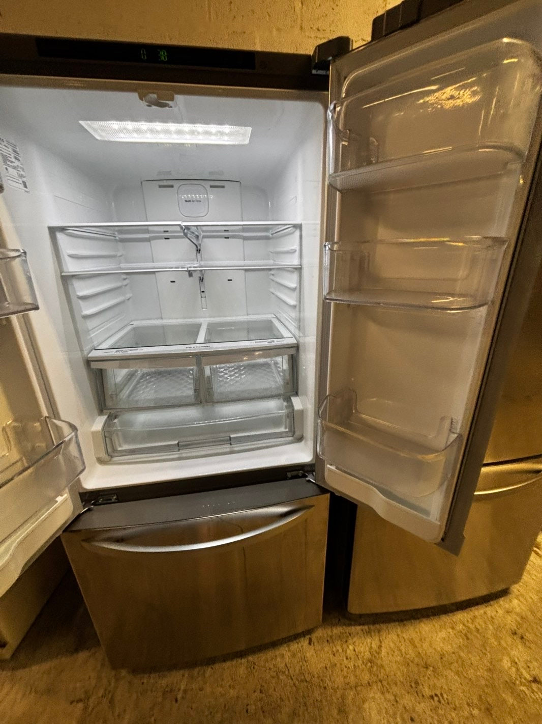 > LG 30” wide French Door Refrigerator in Stainless Steel with ice maker inside used-refurbished # RFD2BB