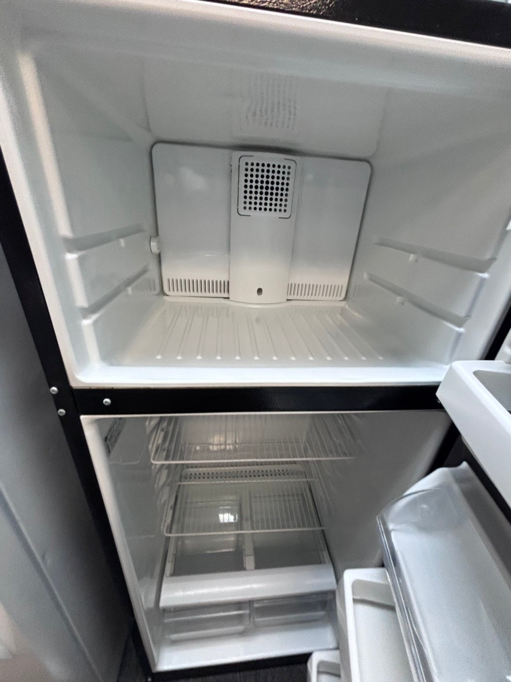 >Hot point  28”top freezer fridge black used-refurbished #HJX13B