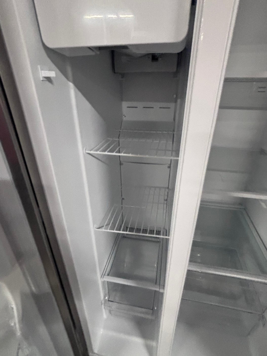 >used-refurbished Frigidaire 33” Side by Side Refrigerator stainless steel w/ice water dispenser  - #RFUR33LB