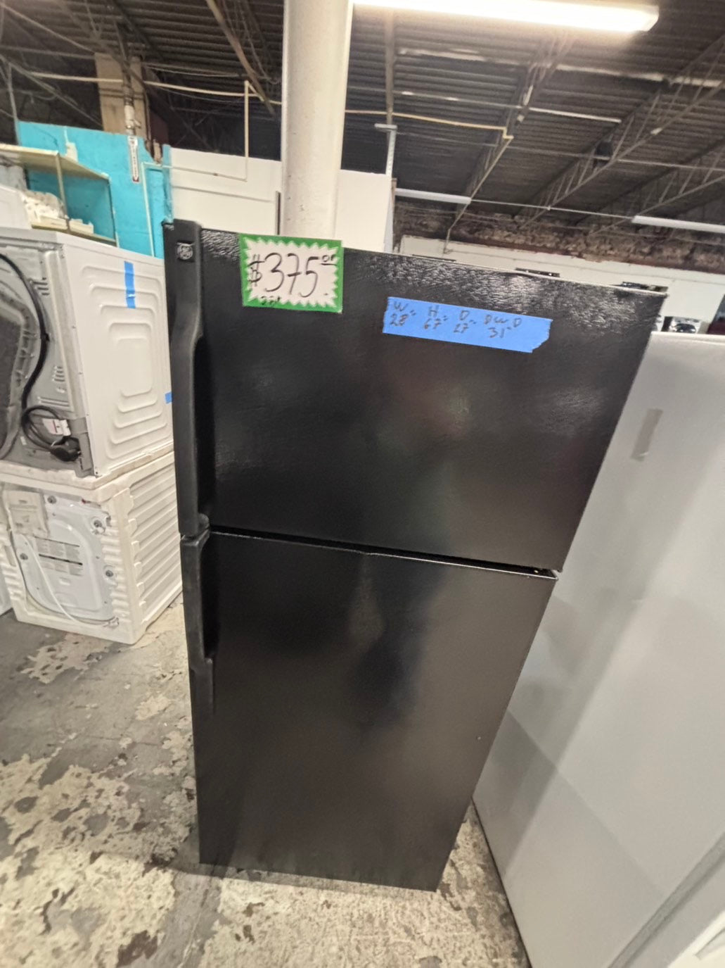 >*28” x 67”H GE  top freezer fridge black   used-refurbished #FGTR67WB