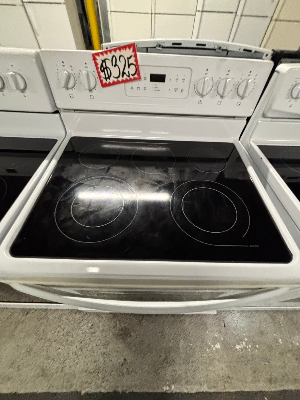 -Frigidaire glass top electric range 220v 5 burner warm zone bake broil self clean used-Refurbished white color fast boil 30"    Stock number #EF350CB