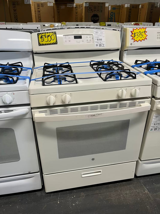 GE Gas range 4 burner bake broil hi/lo in off white Refurbished 30" #GR215WB