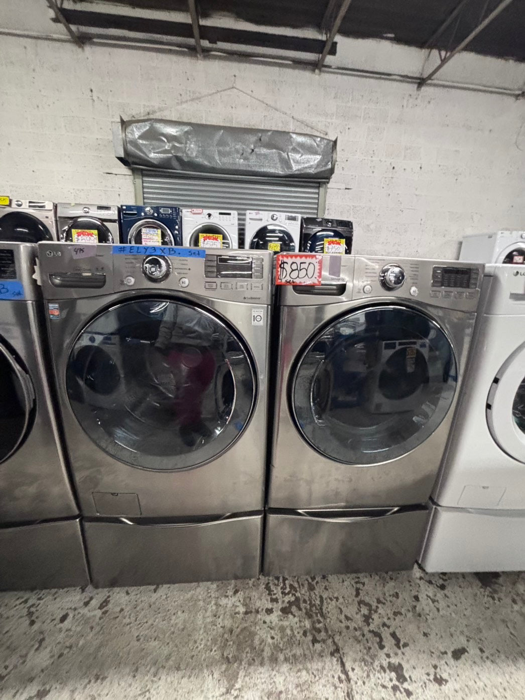 >used- refurbished LG front load washer & dryer set electric 220v large capacity with pedestals in stainless steel 27” #ELY3X45B