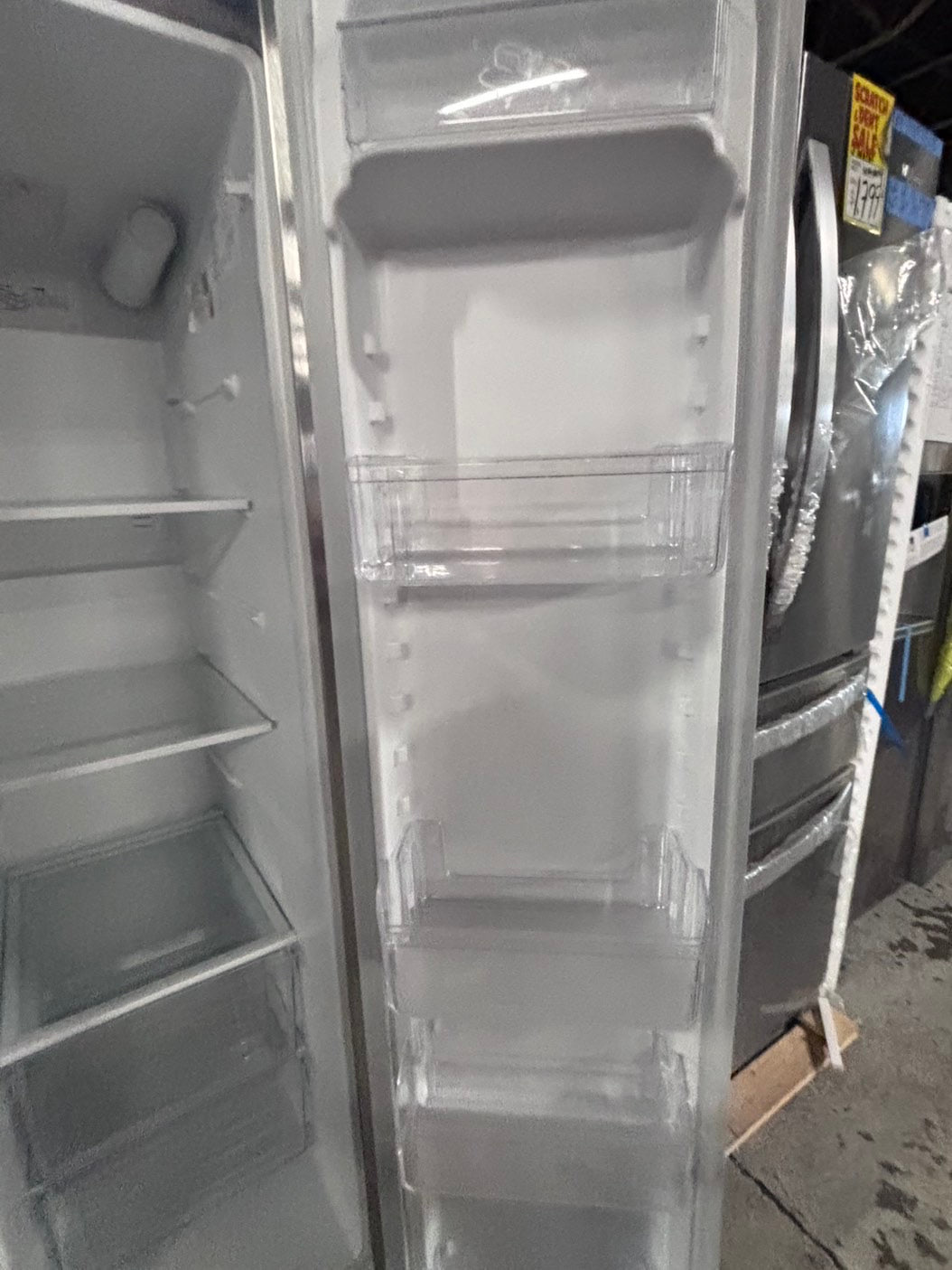 >used-refurbished Frigidaire 33” Side by Side Refrigerator stainless steel w/ice water dispenser  - #RFUR33LB
