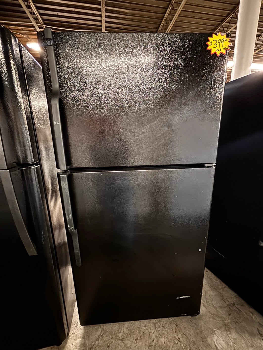 >GE 33” Top freezer fridge with ice maker inside ,black refurbished #RFTY3HB