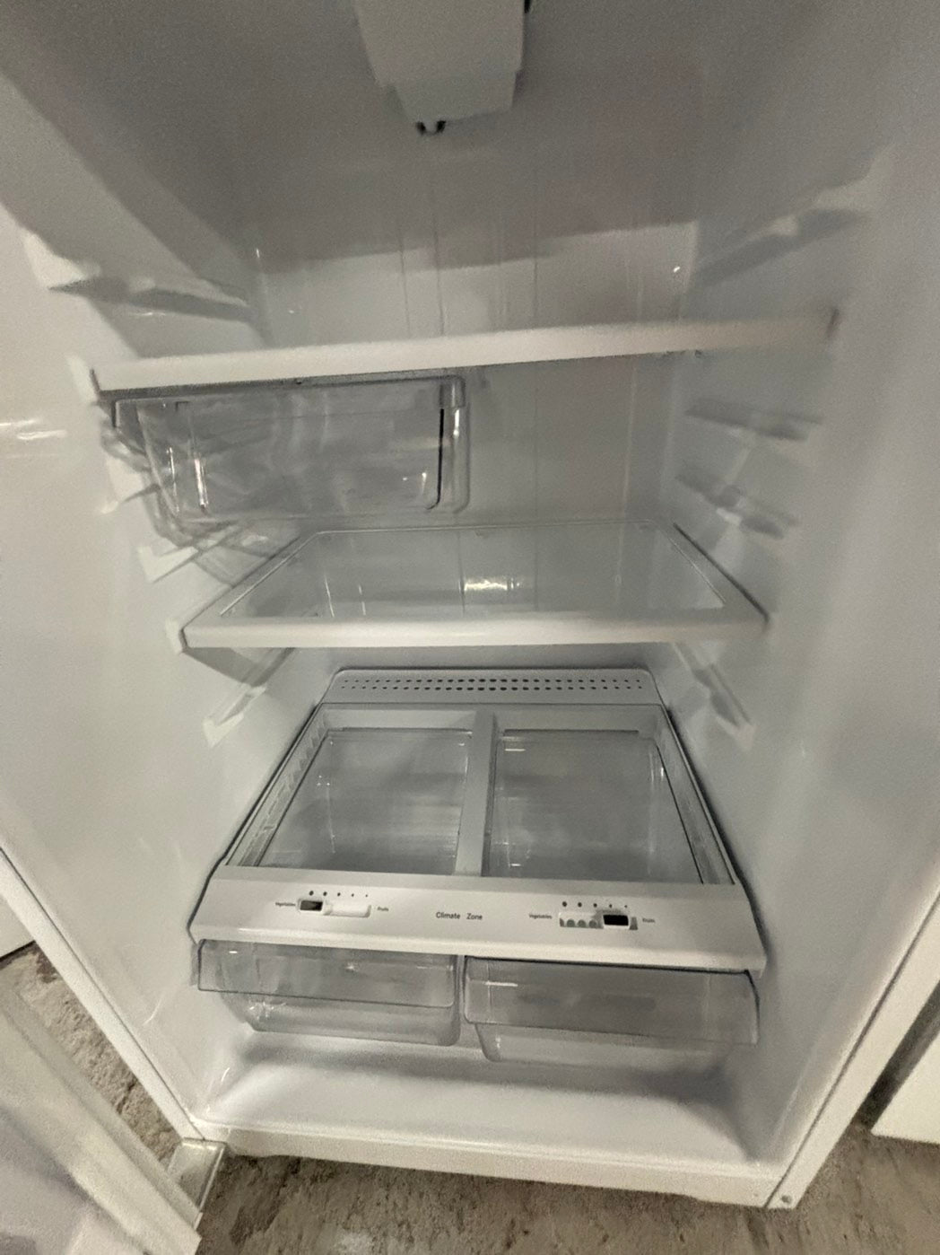 * GE used like new-top freezer refrigerator in white no ice maker 28" #RF1139FB