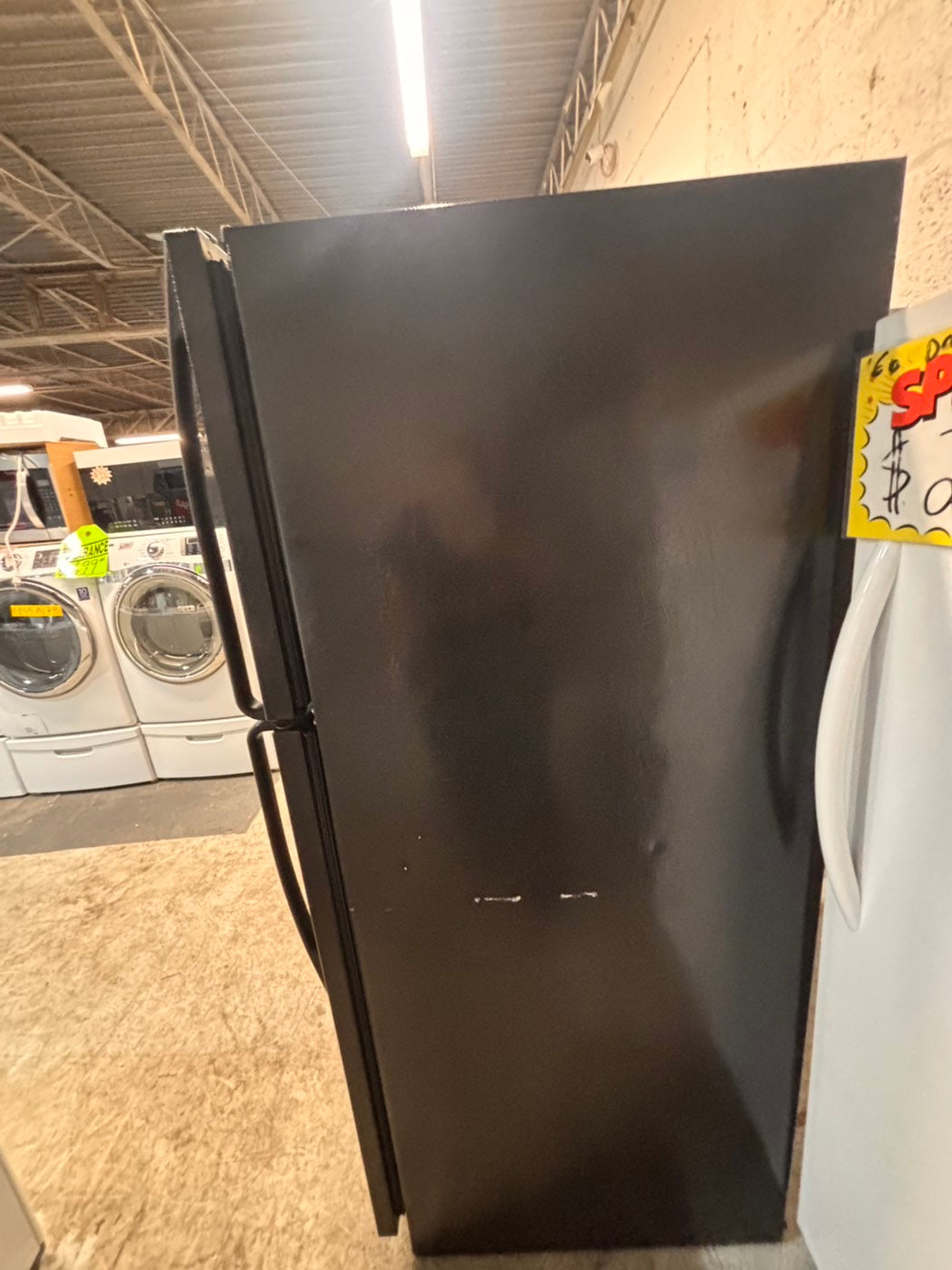 >*whirlpool  30” 18cu.ft -top freezer refrigerator black  with ice maker inside  used-refurbished #RW3B61B