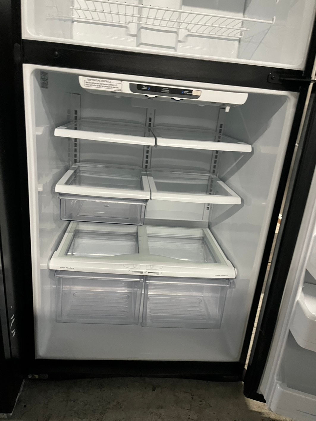 = Ge 33” Top freezer fridge  black refurbished #RFTB67B