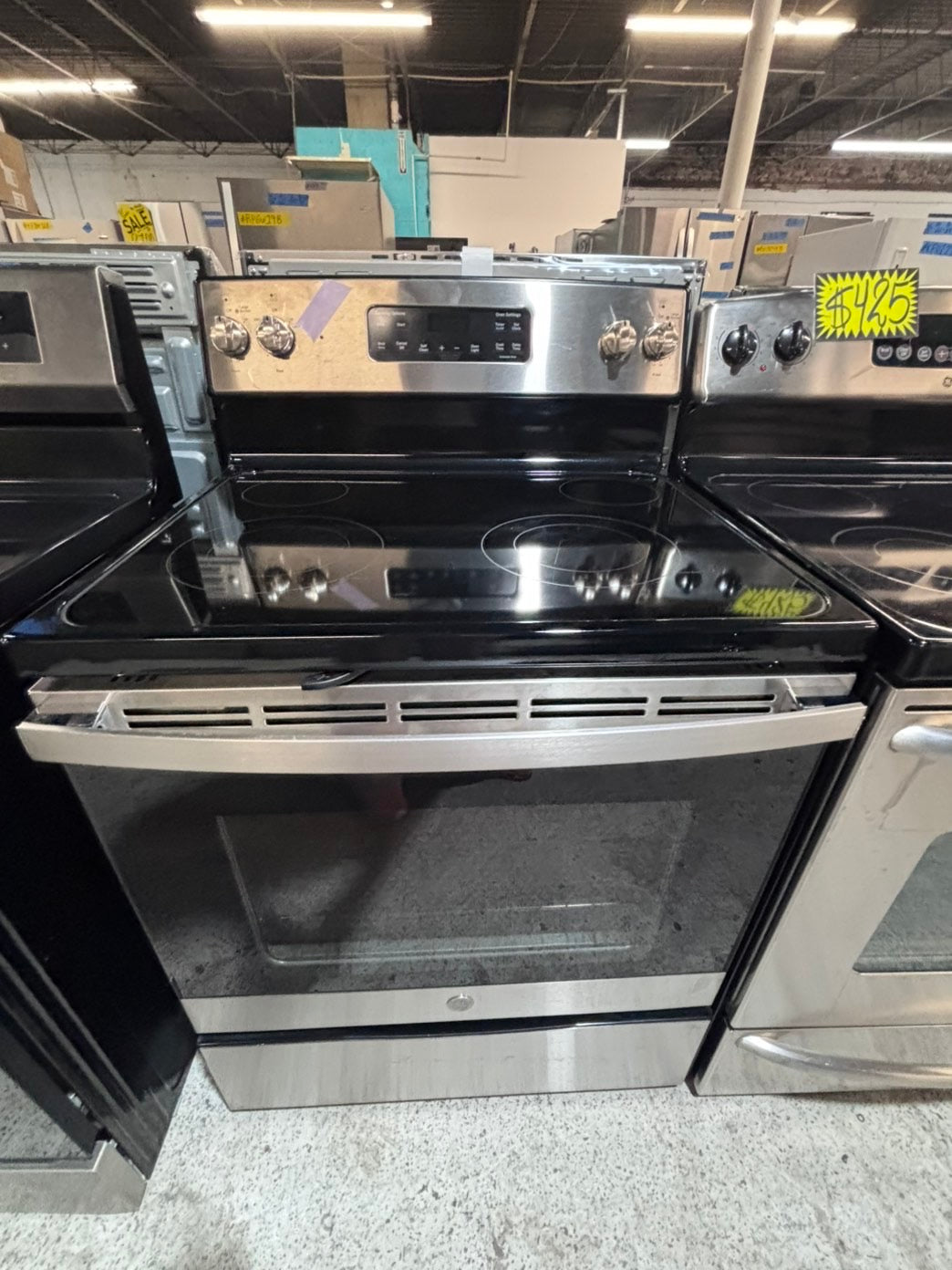 >*GE electric 220v glass top range 4 burner  bake Broil roast self clean stainless steel 30" Refurbished #EGNY33B