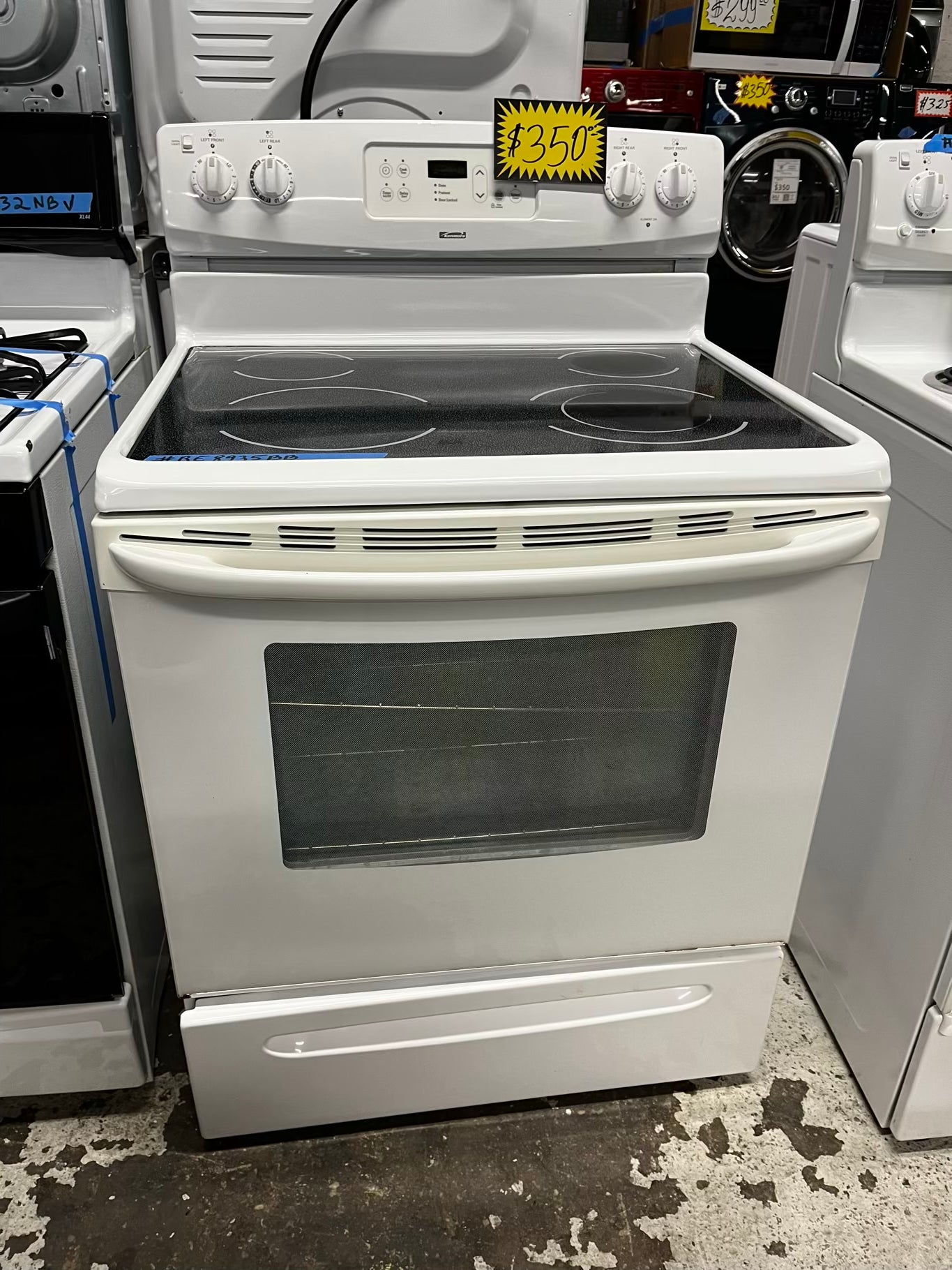 Kenmore electric 220v range 4 burner self clean in off white 30” Stock number #RE8935BB