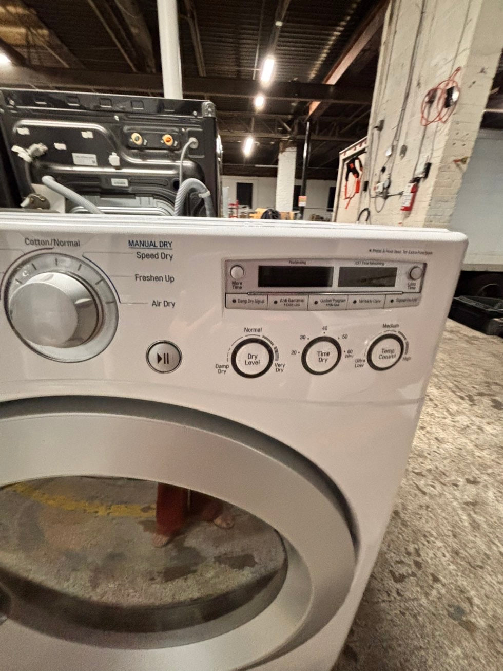 >LG  front load stackable GAS dryer in white , stainless steel drum 27" #EWY71B