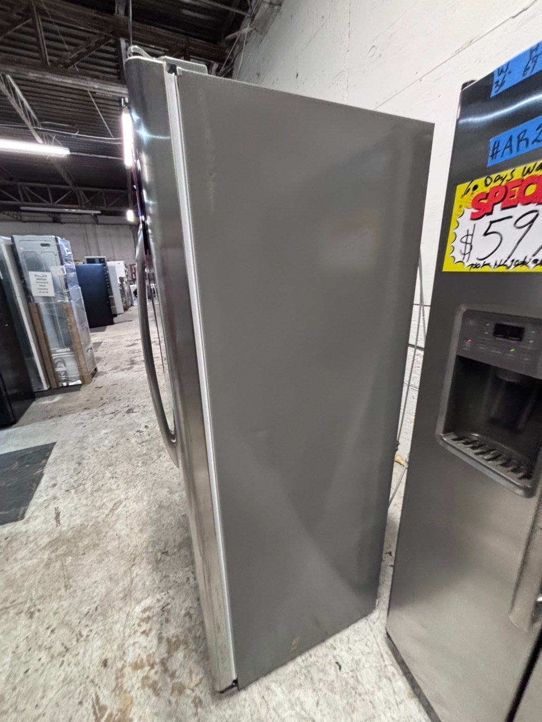 >*36” GE counter depth side by side door fridge  stainless steel w/ice water dispenser 36” #GE24AAB