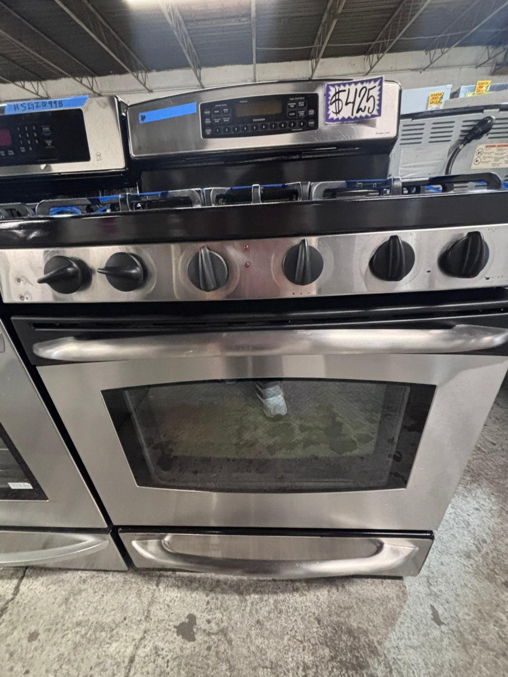 >GE  Gas range 5 burner bake broil Hi/Lo self clean in stainless steel used-Refurbished 30” #GEG1X2B