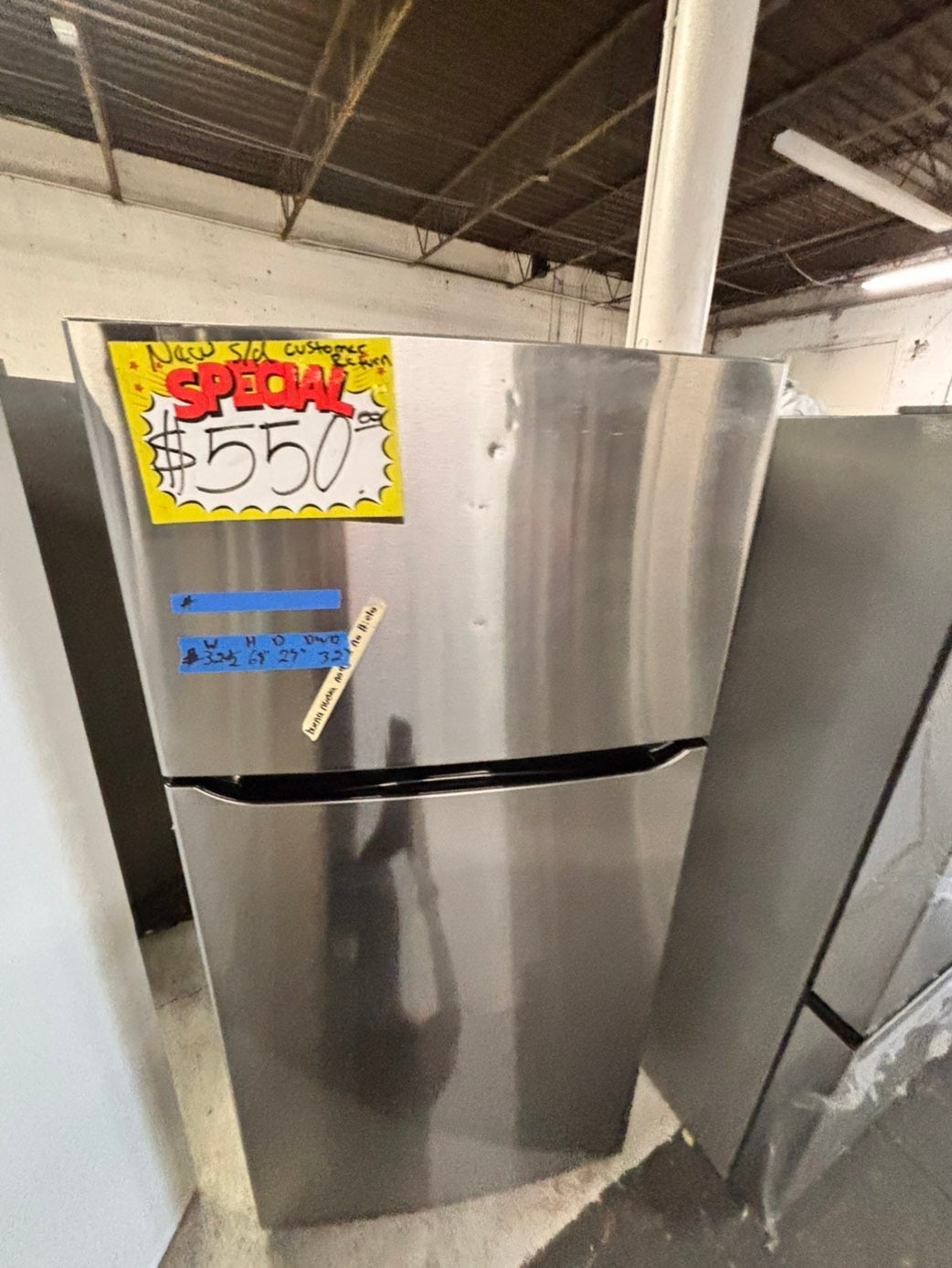 >new open box costumer return scratch & debt LG 33” Top freezer fridge, stainless #RLCF3C2B