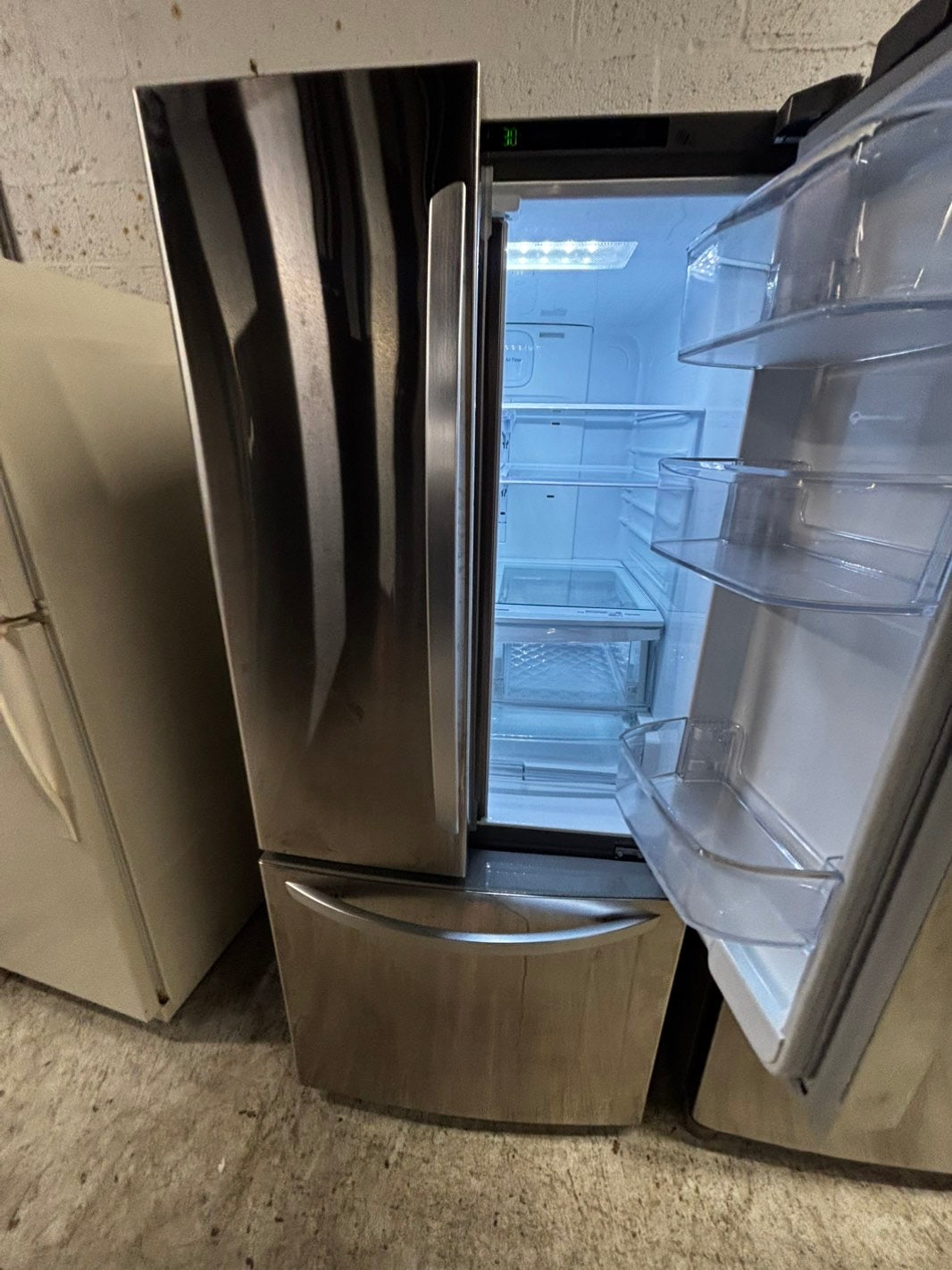 > LG 30” wide French Door Refrigerator in Stainless Steel with ice maker inside used-refurbished # RFD2BB
