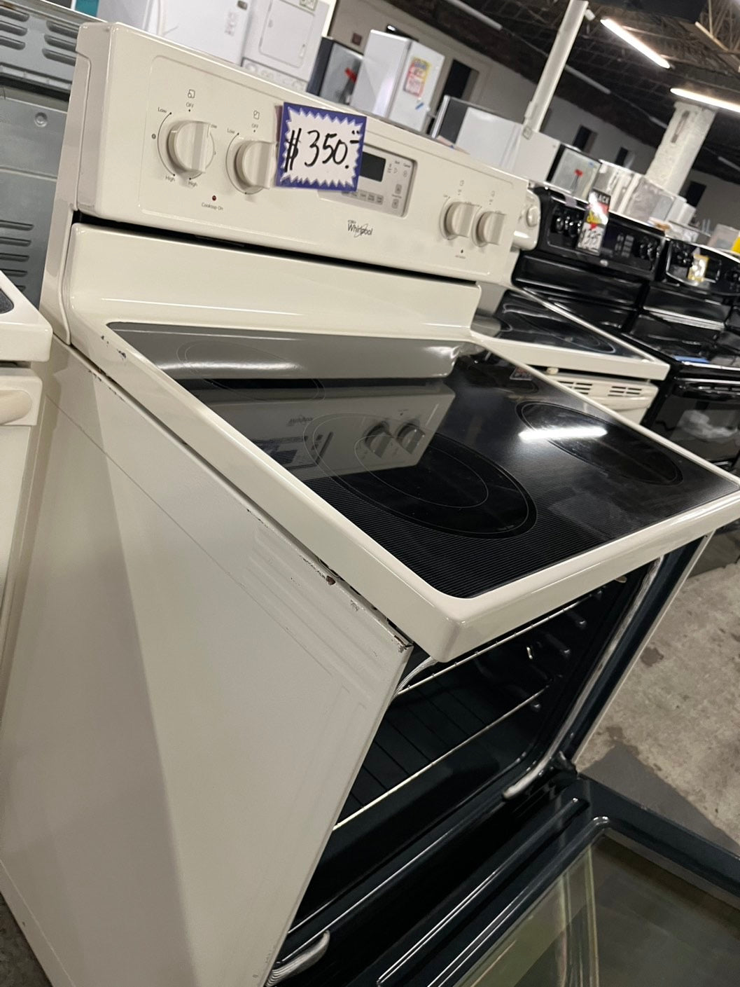 - Whirlpool electric range 4 burner bake broil frozen bake in Self clean off white  30” #ELWP4B