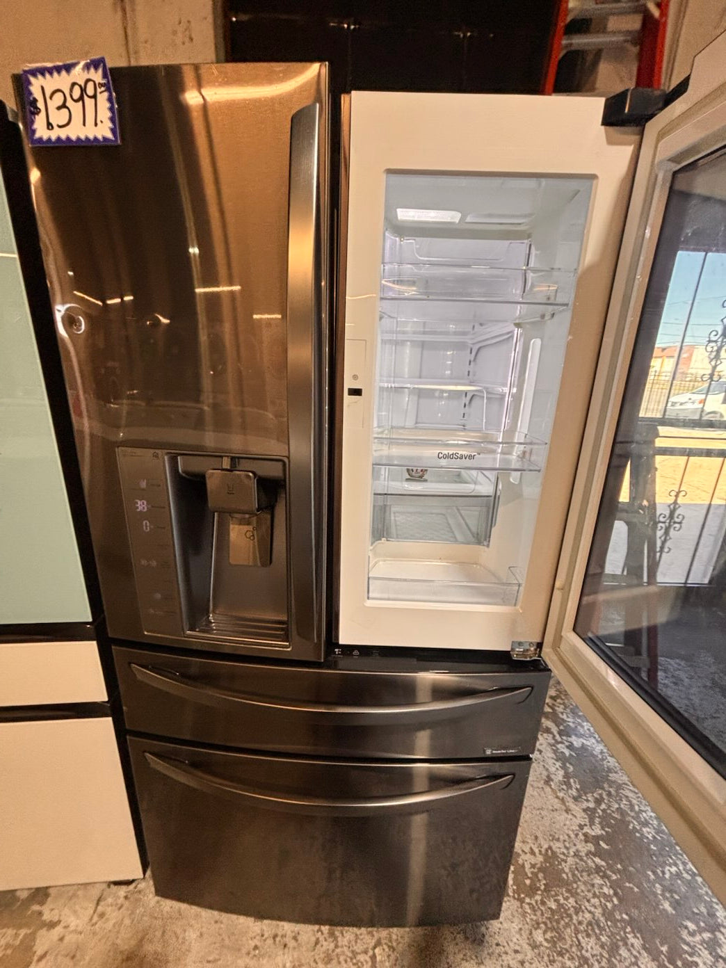 }}LG four door Refrigerator french doors full size 36”x 69” x 32”depth   black stainless steel w/ ice water dispenser great condition 36" used-refurbished #LGFBS324B