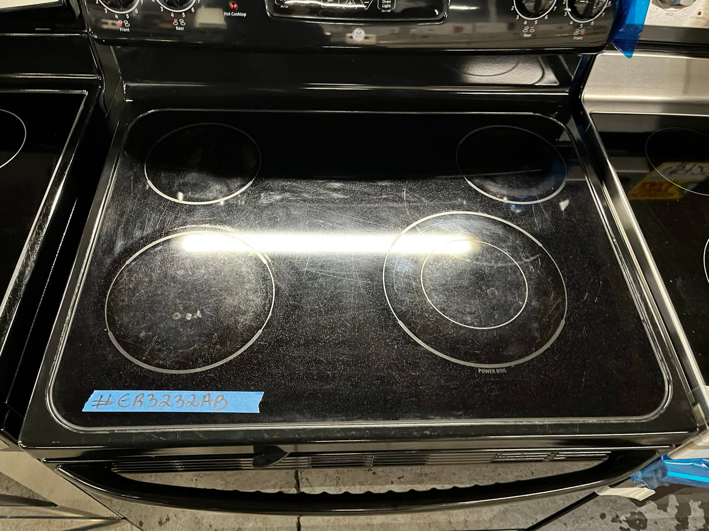 • GE glass top electric range 220v 4 burner Refurbished in black bake Broil hi/lo self clean  30" #ER3232AB