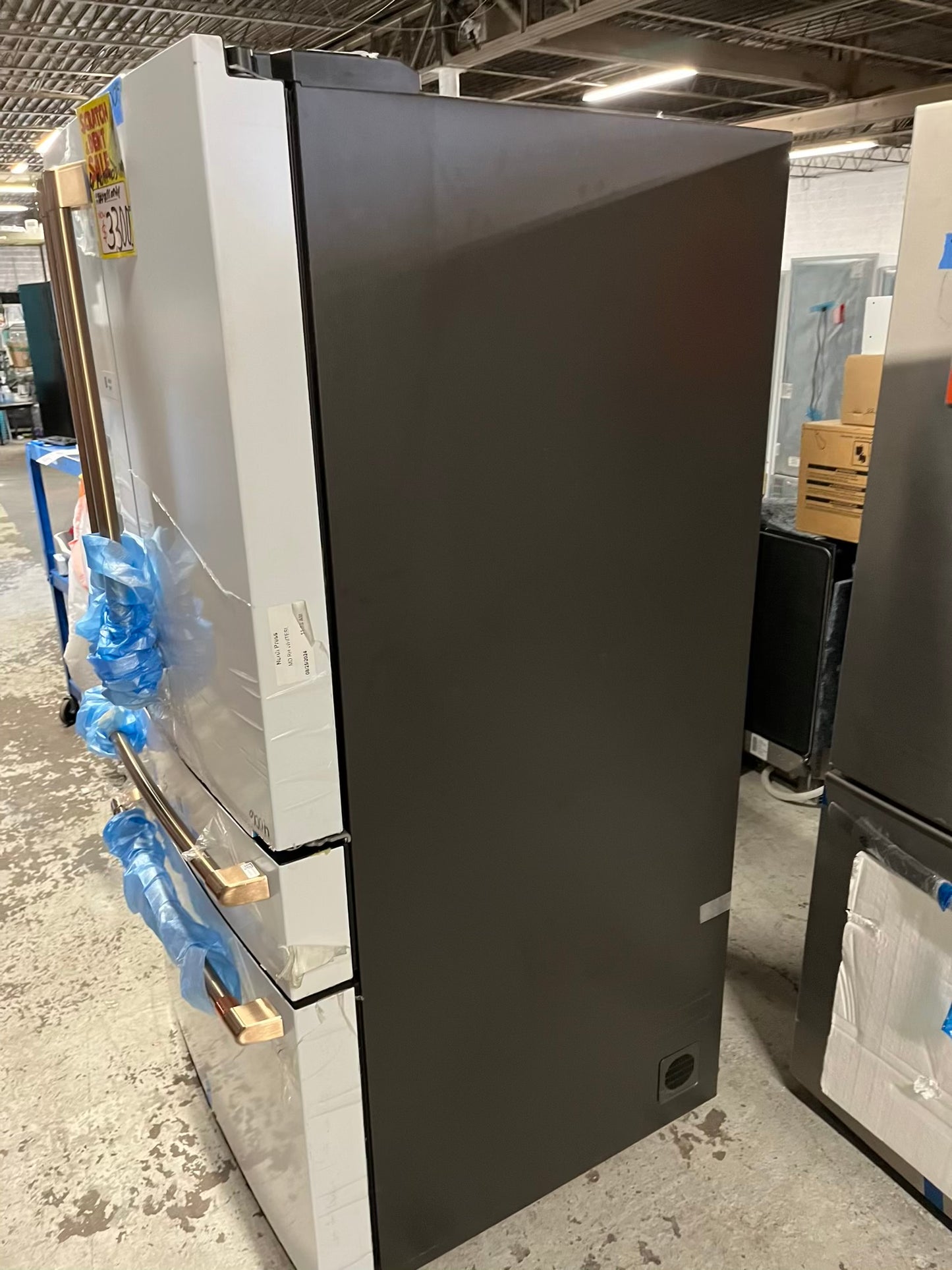 GE Café 36 Inch 4-Door French-Door Smart Refrigerator with 27.8 Cu. Pt. Capacity, TwinChill™, Convertible Drawer, LED Light Tower, Auto Fill, Humidity Control System, Shabbos Mode ENERGY STAR® Matte White with Brushed Bronze Handles 36” #RF840EB