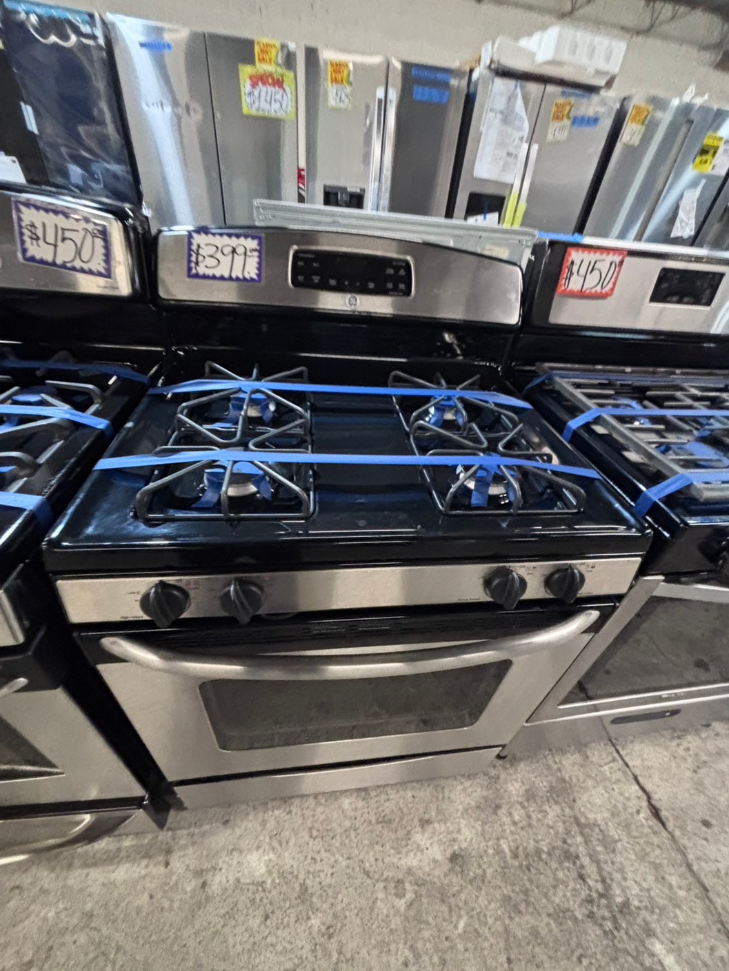 >*GE range 4 burner bake ,broil Hi/Lo self clean in stainless steel used-Refurbished 30” #GSG10SB