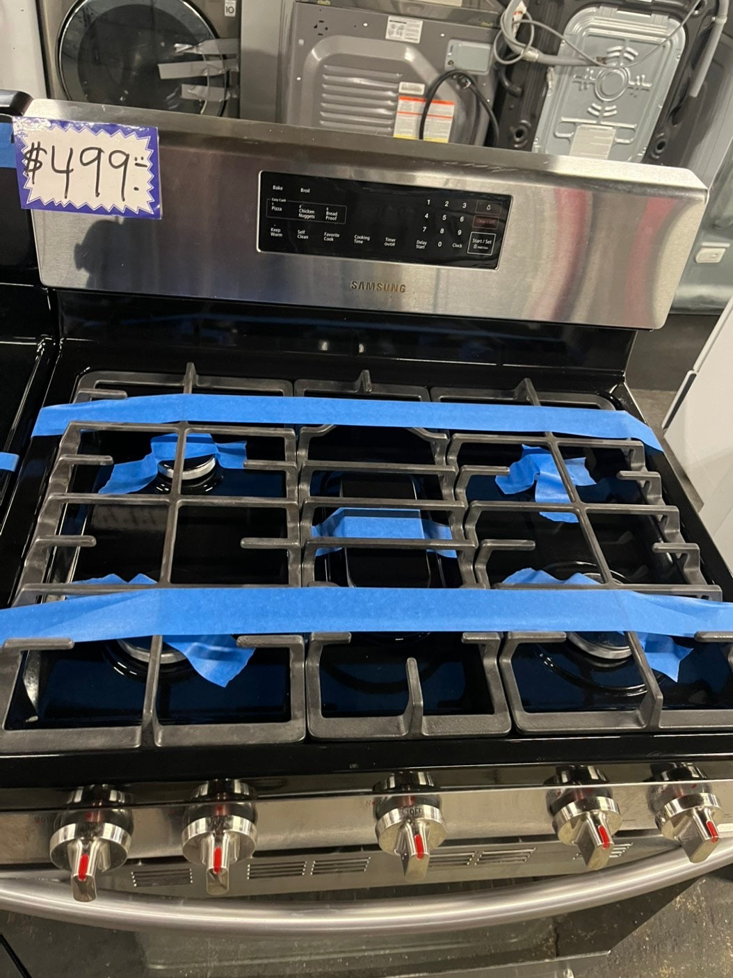 =Samsung  gas stove 5 burner keep warm self clean bake broil i/lo in black & silver -used-Refurbished 30” #GTTA19B